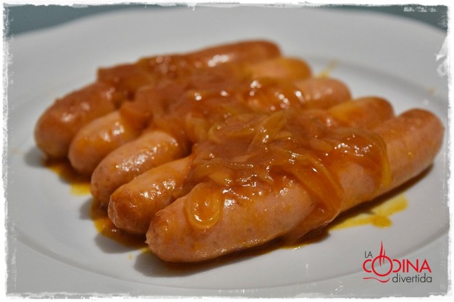 salchichas de pollo con tomate y vino añejo de Serrada